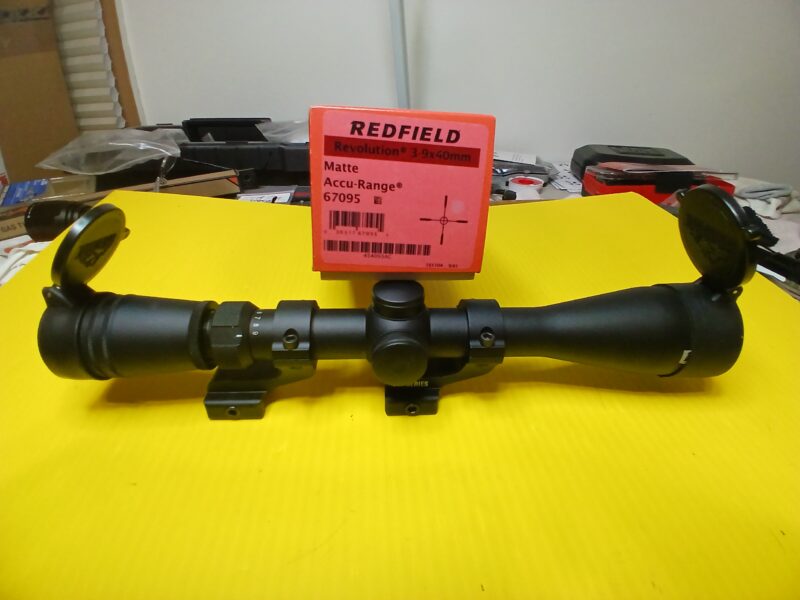 Redfield Revolution Accu-Range 1" 3x9x40 scope with Nikon rings and Butler Creek lens covers.