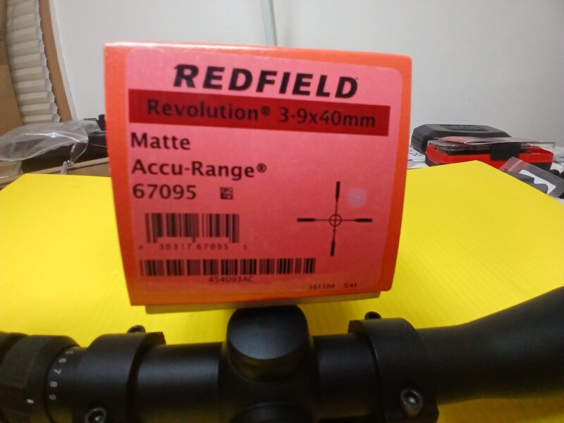 Redfield Revolution Accu-Range 1" 3x9x40 scope with Nikon rings and Butler Creek lens covers.