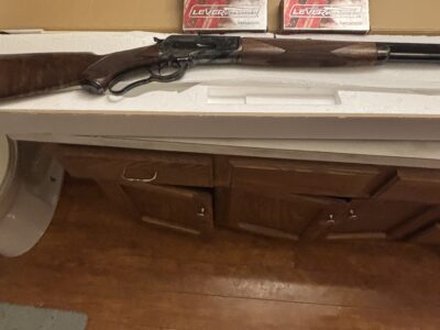 Mint condition Winchester 1886 45/70 hard color case rifle plus ammunition