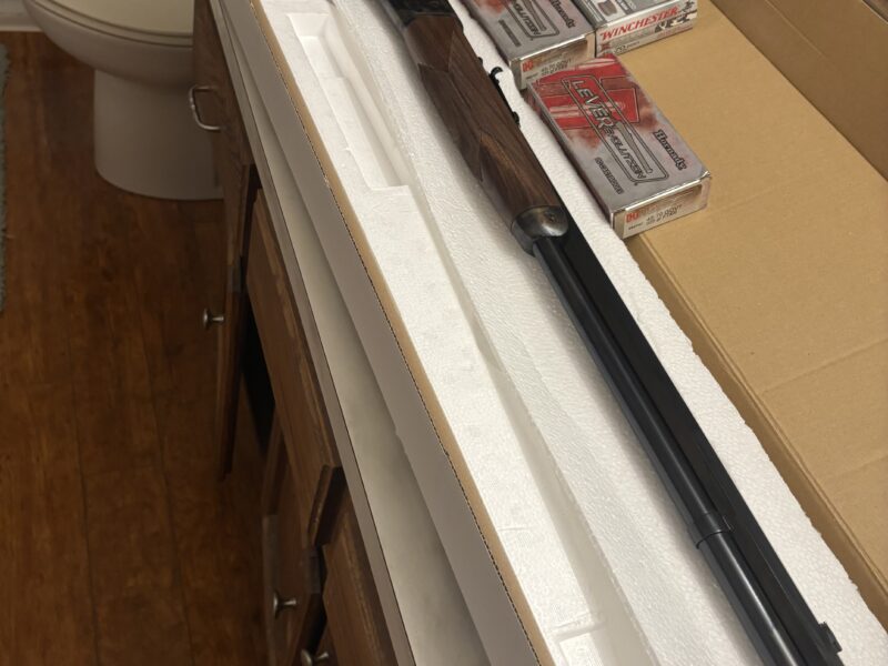 Mint condition Winchester 1886 45/70 hard color case rifle plus ammunition