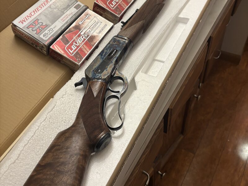 Mint condition Winchester 1886 45/70 hard color case rifle plus ammunition