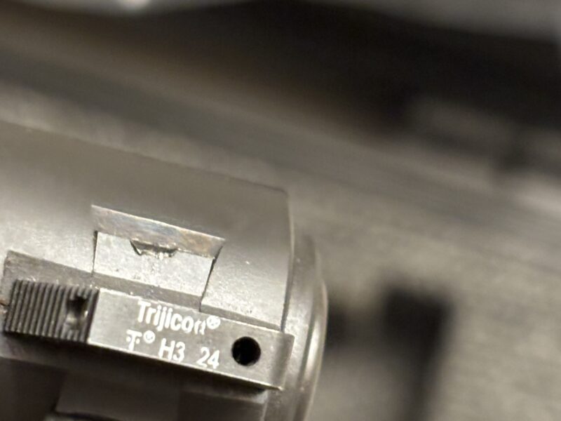 1911 Tisas with trijicon sites and 2 holsters