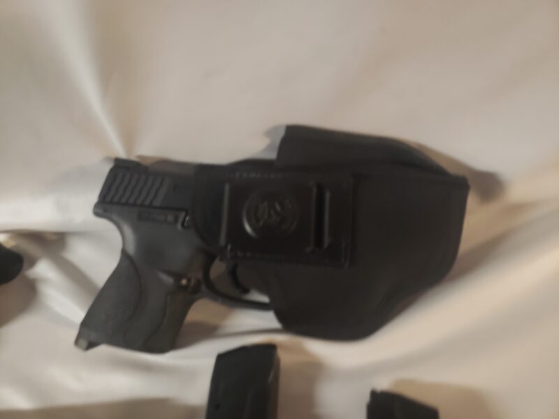 M&P 40 Cal With Laser Sights, Ammo, Sheth and 2 Clips